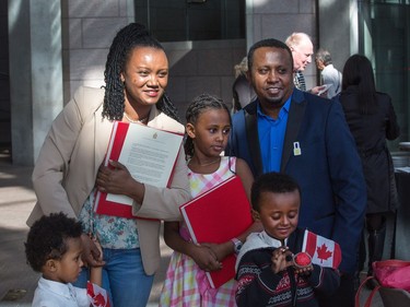 Amarech Yemane Habtemariam poses with her family for a photo after she and her daughter Salem Kassahun Sisay became Canadian citizens during a special community citizenship ceremony held in the Great Hall at the National Gallery of Canada. Her husband is Kassahun Mengesha and the boys are Enoch Sisay, 4, and Marken Sisay, 2.