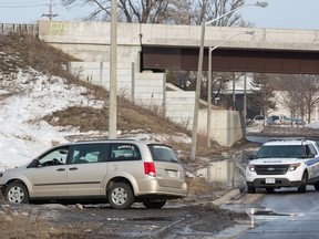 The van sits on Robinson Street near Lees Avenue following the police chase.