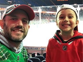 Glen Lowry with his son, Adam Lowry-Burmester. Adam hasn't come back down to Earth since Ottawa Senators rookie Brady Tkachuk engaged in a floss-off dance competition with him before a game in Calgary.