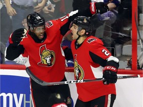 Ottawa Senators left wing Anthony Duclair (10) celebrates his goal against the Toronto Maple Leafs with teammate Ottawa Senators defenceman Dylan DeMelo (2) during third period NHL hockey action in Ottawa on Saturday, March 16, 2019.