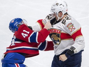 The Montreal Canadiens' Paul Byron fights the Florida Panthers' MacKenzie Weegar on Tuesday, March 26, 2019 in Montreal.
