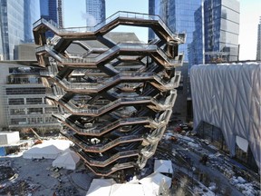 This March 5, 2019, aerial photo shows "Vessel," a 150-foot-tall structure of climbable interlocking staircases, that is the center point of the $25 billion Hudson Yards Redevelopment in New York. The climbable structure opens to the public on Friday, March 15.