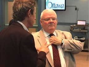 A 2017 file photo of City of Ottawa auditor general Ken Hughes, right.