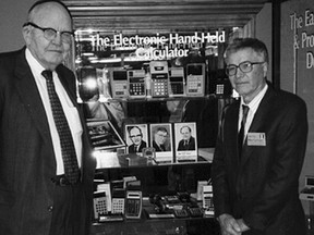 This 1997 photo taken by Phyllis Merryman shows Jack Kilby, left, and Jerry Merryman, right, at the American Computer Museum in Bozeman, Montana.