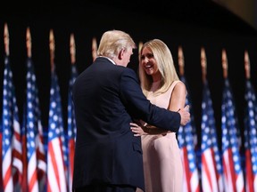 FILE: Donald Trump, 2016 Republican presidential nominee, left, greets his daughter Ivanka Trump on stage during the Republican National Convention (RNC) in Cleveland, Ohio, U.S., on Thursday, July 21, 2016.