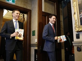 Prime Minister Justin Trudeau and Finance Minister Bill Morneau arrive at the House of Commons before tabling the federal budget in Ottawa on March 19, 2019.