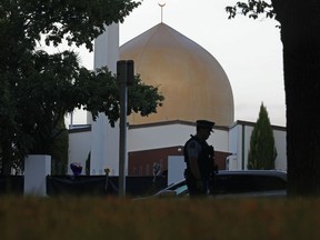 In this March 17 photo, a police officer stands guard in front of the Al Noor mosque in Christchurch, New Zealand.