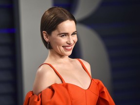 FILE - This Feb. 24, 2019 file photo, Emilia Clarke arrives at the Vanity Fair Oscar Party in Beverly Hills, Calif. Clarke has revealed she's had two life-threatening aneurysms, and two brain surgeries, since the show began. In a first-person story Thursday in The New Yorker, Clarke said she had been healthy all her life when had the first brain aneurysm in 2011 at age 24 while working out at a London gym.