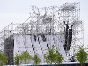 A collapsed stage is shown at Downsview Park in Toronto on Saturday, June 16, 2012. An inquest is set to get underway today into the fatal stage collapse at a Radiohead concert in Toronto nearly seven years ago. The band's drum technician, Scott Johnson, was killed when a massive structure crashed down on him on June 16, 2012 - just hours before Radiohead was set to take the stage at Downsview Park.