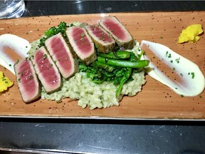 Seared rare yellow fin tuna with 
herbed Israeli couscous, broccolini, wilted greens, preserved lemon
relish at Rabbit Hole