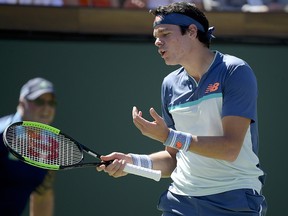Milos Raonic reacts to losing a point to Dominic Thiem during their semifinal match at the BNP Paribas Open Saturday, March 16, 2019, in Indian Wells, Calif. (AP Photo/Mark J. Terrill)