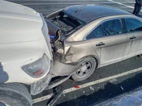 Police officer struck by truck while conducting traffic stop.