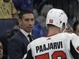 New Ottawa Senators assistant coach Chris Kelly, left, talks to left wing Magnus Paajarvi (56) during the third period of the team's NHL hockey game against the Tampa Bay Lightning on Saturday, March 2, 2019, in Tampa, Fla.