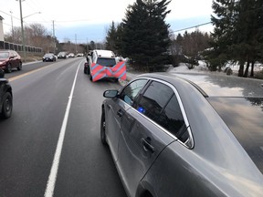 Police obscure licence plate of car being towed after being timed doing 134 km/h in a 80 zone Friday.