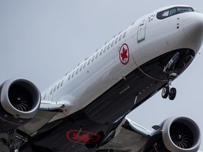 An Air Canada Boeing 737 Max aircraft arriving from Toronto prepares to land at Vancouver International Airport in Richmond, B.C., on Tuesday, March 12, 2019. Air Canada cancelled London-bound flights from Halifax and St. John's Tuesday and Wednesday after the United Kingdom banned all Boeing Max 8 jets in its airspace.