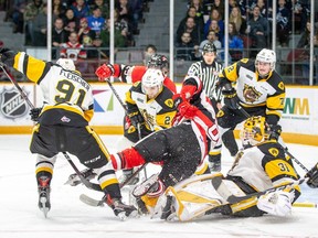 Sasha Chmelevski, who had two goals and two assists in the series opener, is in the middle of a mad scramble in front of  Hamilton Bulldogs netminder Zachary Roy during Game 1 of an Ontario Hockey League Eastern Conference quarterfinal playoff series at TD Place arena in Ottawa on Friday, March 22, 2019.