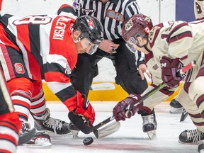 Ottawa 67's centre Sasha Chmelevski (8, middle) faces off against Semyon Der-Arguchintsev of the Peterborough Petes during an Ontario Hockey League game at TD Place arena in Ottawa on Friday, March 15, 2019. The Petes won 3-2 in overtime. Valerie Wutti/OSEG.