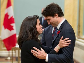 In this file photo taken on November 04, 2015, Prime Minister Justin Trudeau speaks with Minister of Justice Jody Wilson-Raybould during a swearing-in ceremony at Rideau Hall, Wednesday Nov.4, 2015. Those were better days.