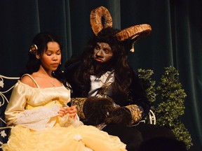 Claire Vilsaint as Belle and Francisco Estrella as Beast, during St. Patrick's High School's Cappies production of the Disney's Beauty and the Beast, on March 30, 2019.