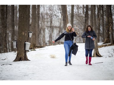 Sam Guiboard, left, and Maxine Corriveau were among Saturday's attendees at the Vanier Sugar Festival.