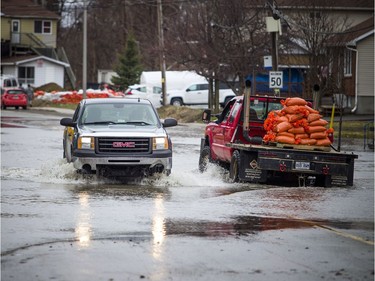 A familiar street from the 2017 flooding was showing signs of high water already on Rue Saint-Louis.