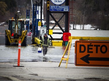 The Masson-Angers ferry had flooding, but a work-around launch was built so people could still get across the river Saturday.