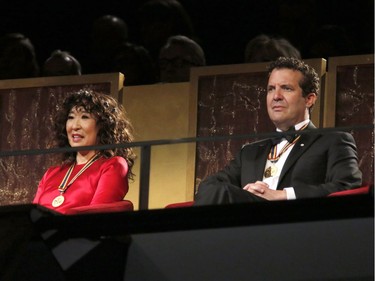Award recipients Sandra Oh and Rick Mercer watch a performance at the Governor General's Performing Arts Awards at the National Arts Centre in Ottawa on Saturday, April 26, 2019.