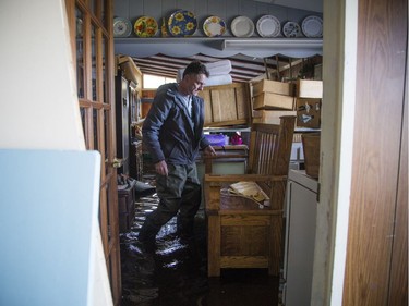 Kevin Dodds asses the water levels hitting his parents summer home. A state of emergency was declared in Rhoddy's Bay, west of Arnprior, on the Ottawa River Sunday, April 28, 2019.