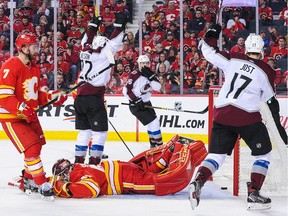 Colin Wilson #22 of the Colorado Avalanche scores on the net of Mike Smith #41 of the Calgary Flames in Game Five of the Western Conference First Round during the 2019 NHL Stanley Cup Playoffs at Scotiabank Saddledome on April 19, 2019 in Calgary, Alberta, Canada.