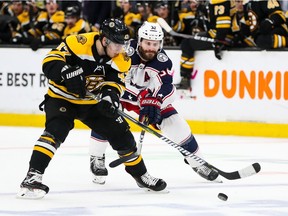 Torey Krug of the Boston Bruins skates with the puck in Game Two of the Eastern Conference Second Round against the Columbus Blue Jackets during the 2019 NHL Stanley Cup Playoffs at TD Garden on April 27, 2019 in Boston, Massachusetts.