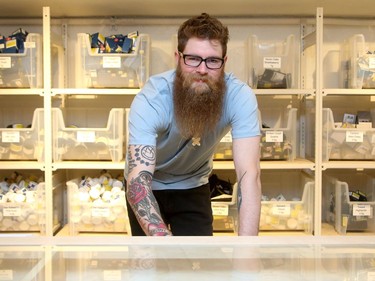Cannabis Retail Associate Nick Pelehos in the lower level of the store, which is for customers who already know what they want and can order it quickly.  There are 36 strains on offer from about a dozen different brands.  Hobo Recreational Cannabis Store on Bank Street was one of three pot retailers to open in Ottawa Monday (April 1, 2019) as part of the province's new cannabis retail model rollout.