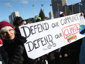 Ottawa residents rallied outside Ottawa City Hall to demonstrate support for a motion to declare a climate emergency, April 16.