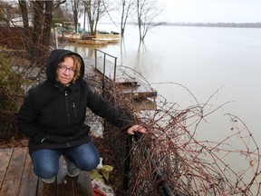 Sylvie Goneau stands on the edge of her property along the Ottawa River, April 20, 2019. She is concerned about flooding.