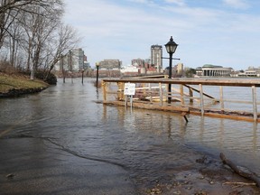 Flooding behind Parliament Hill in Ottawa on the bike path on Tuesday.