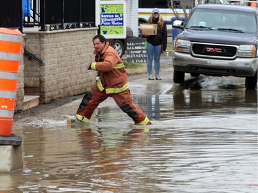 Homes and streets of Saint-André-Avellin are flooded by the the Petite-Nation River on Wednesday.