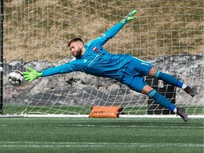 Ottawa Fury FC goalkeeper Callum Irving makes a diving save on a shot by Loudoun United during a United Soccer League Championship match at TD Place stadium in Ottawa on Saturday, April 12, 2019. Ottawa won the match 2-0.