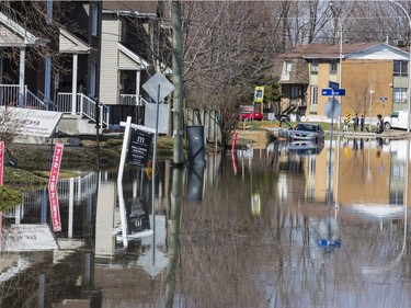 Rising flood waters along rue Saint Louis in Gatineau, Quebec on April 22, 2019.