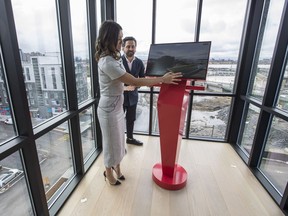 The official opening of Zibi House: the region's newest landmark and cultural centre. Featuring the Ottawa River's only 8-storey observation deck, Zibi House is a cultural sensory experience where visitors can smell, hear, touch, taste and experience Zibi, the Waterfront City. Krystal Koo, Head of Sales and Marketing, Dream Unlimited and Zibi and Paolo Ferrari, Founder, Paolo Ferrari Studio atop the 8-storey observation deck. April 24, 2019.