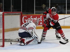 The Ottawa 67's Marco Rossi gets the puck past Oshawa Generals goalie Kyle Keyser for a first-period goal at the TD Place arena in the East Conference final opener at TD Place arena.
