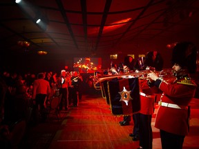 Fanfare trumpets of the Regimental Band of the Governor General's Foot Guards played as the head table party arrived.