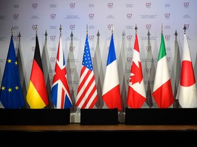 This picture taken on April 5, 2019, shows flags of European Union, Germany, United-Kingdome, the United States of America, France, Canada, Italy and Japan during a meeting to prepare the G7 Summit in Biarritz which will take place from August 25 to 27, 2019, in Dinard.