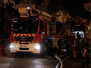 Firefighters are seen working near Notre-Dame Cathedral in Paris early on April 16, 2019. - The main structure of Notre-Dame cathedral in central Paris has been saved after hours of fire-fighting to put out a devastating blaze, the city's top fire official said late on April 15.