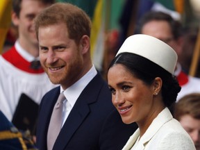 In this Monday, March 11, 2019 file photo, Britain's Prince Harry and Meghan, the Duchess of Sussex leave after the Commonwealth Service at Westminster Abbey in London.