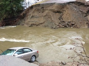 A car was swept off the road during flooding in the Pontiac area.