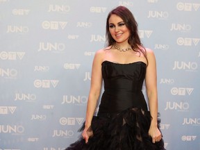 Tanya Tagaq poses on the red carpet during the 2015 Juno Awards in Hamilton, Ont., on Sunday, March 15, 2015. Inuit throat singer and author Tagaq is in line to add a lucrative literary prize to her list of accolades.THE CANADIAN PRESS/Peter Power