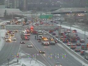 First responders on the scene of a crash on the eastbound Queensway near Vanier Parkway Tuesday morning.