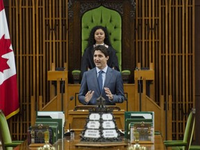 Daughter of the Vote Speaker and delegate for Halifax-West Ampai Thammachack looks on as Canadian Prime Minister Justin Trudeau speaks to Daughters of the Vote in the House of Commons on Parliament Hill in Ottawa, Wednesday April 3, 2019.