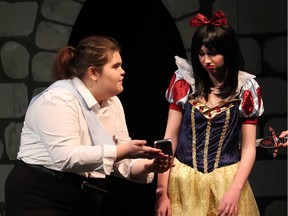 Marley Griese (left) preforms as Guard 2, Julia Silverstone (right) preforms as Snow White, during Sir Robert Borden High School's Cappies production of Game of Tiaras, on April 5th, 2019, in Ottawa.