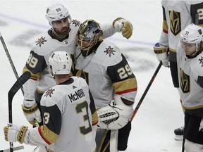 Vegas Golden Knights goaltender Marc-Andre Fleury (29) reacts with right wing Alex Tuch (89), defenseman Brayden McNabb (3) and center William Karlsson (71) after losing to the San Jose Sharks during overtime of Game 7 of an NHL hockey first-round playoff series in San Jose, Calif., Tuesday, April 23, 2019.