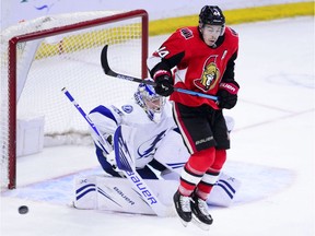 Senators centre Jean-Gabriel Pageau (44) jumps out of the way of a shot on Lightning goaltender Andrei Vasilevskiy (88) during third period of Monday's game at Canadian Tire Centre.